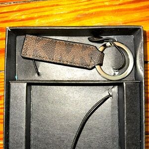 Brown Michael Kors key chain